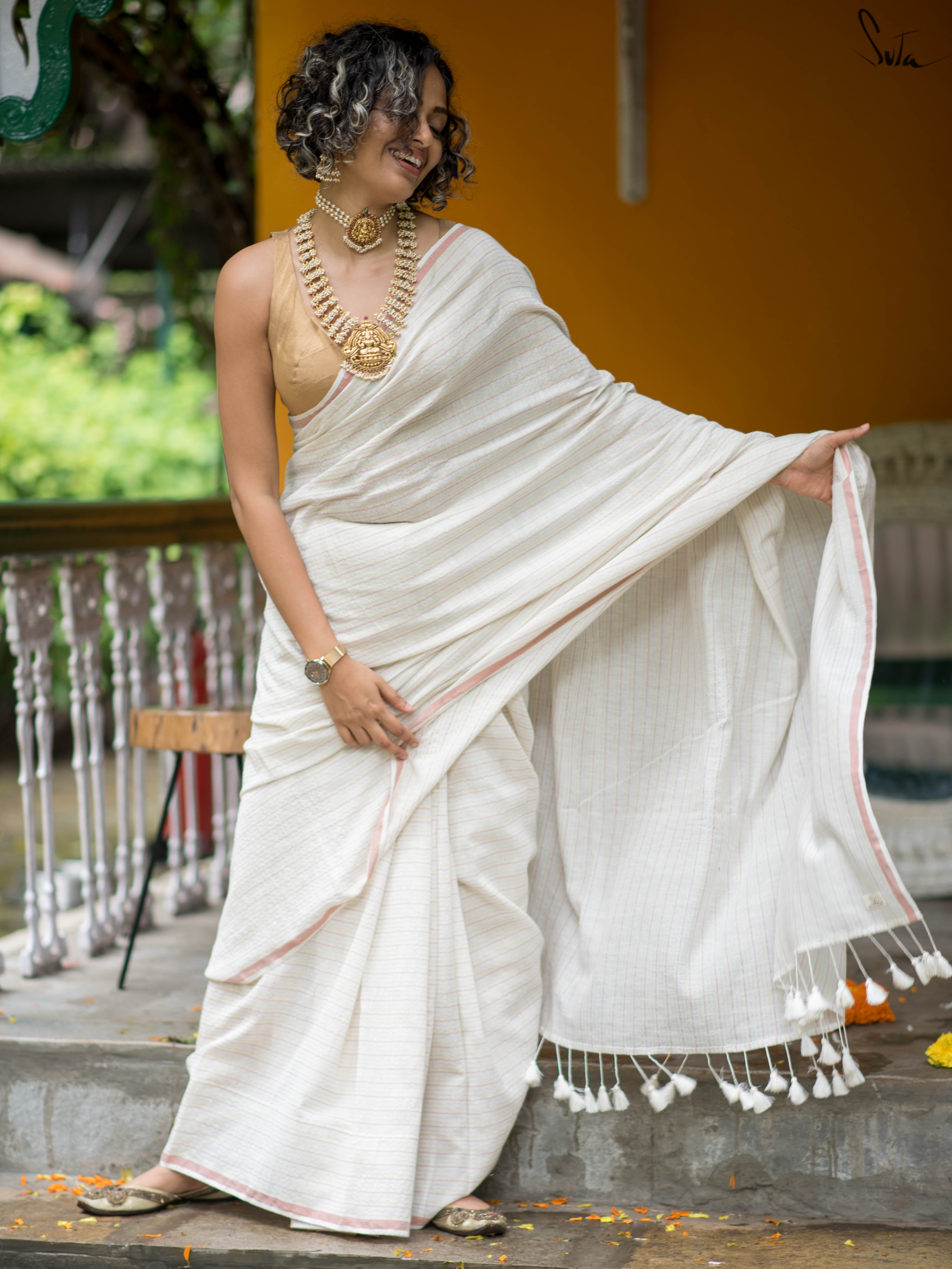 White Soft Cotton Tassels And Stripes Kasavu Onam Saree With Zari Border