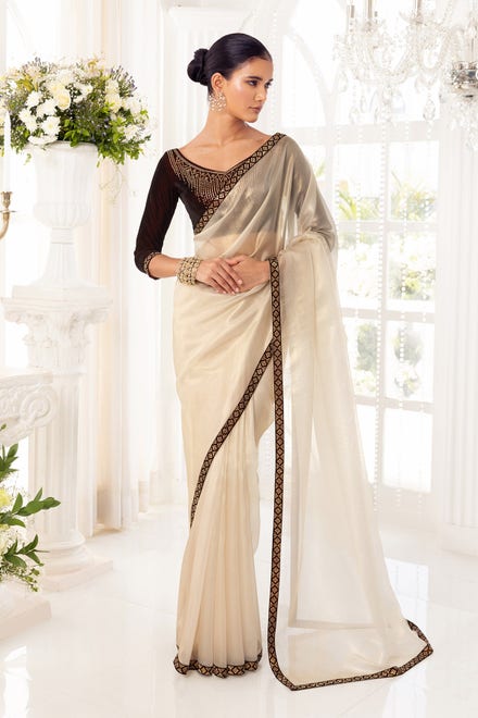 Gold Net Saree With Maroon Borders And Stone Embellishments